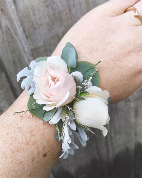 Mother of the bride wrist corsages. A rose and mixed foliage wrist corsage in 2019 | Wrist ...