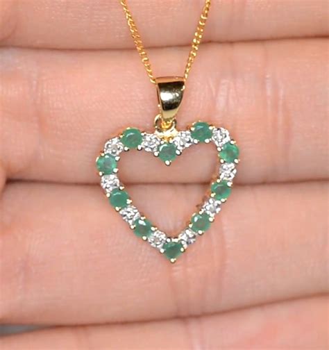 Emerald 054ct And Diamond 9k Yellow Gold Heart Pendant Necklace