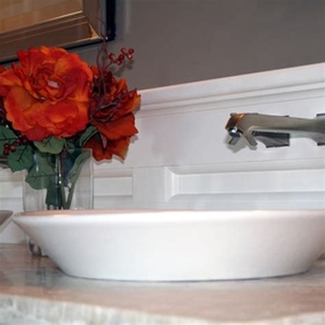 We take a look at how to install a vessel sink that has an overflow drain, which is different than installing a standard vessel it will also show you how to attach. How to Install a Kitchen Sink Without Clamps | HomeSteady