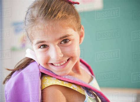 Portrait Of Smiling Schoolgirl 6 7 Stock Photo Dissolve