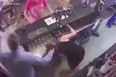 Shocking Pub Cctv Shows Man Attack Barmaid Behind Bar Dragging Her By Hair Across Pint Glasses