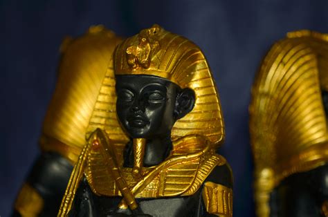 Golden Ancient Egyptian Pharaohs Statuette With Blurred Effect