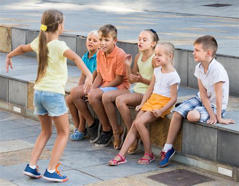Positive Kids Playing Charades Outdoors Stock Image Image Of Friends