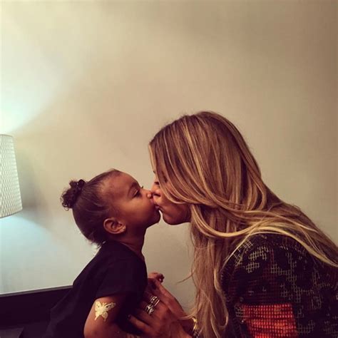 Khloé Kardashian Gets Kiss From North West at Kanye West ConcertSee the Cute Photo E News