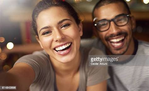 Black Couple Facing Camera Photos And Premium High Res Pictures Getty