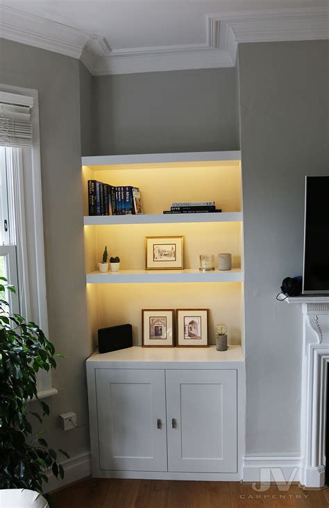 Custom furniture for your living room from gpm design. Alcove Shelves with Lights and Cabinets in the Living room ...