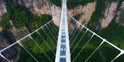 The tourist was trapped 100 metres above ground after glass panels in the piyan mountain bridge fell out during high winds. These Are The Most Dangerous Bridges In The World ...