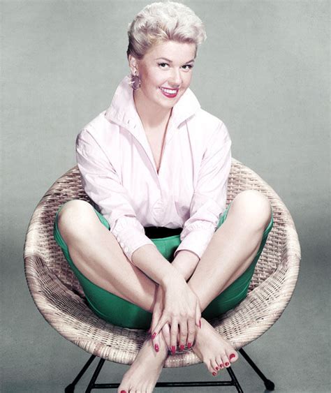 Doris Day Sits Cross Legged And Barefoot In A Rattan Chair Happy
