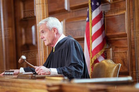 Judge Banging Gavel In Court Stock Photo Dissolve