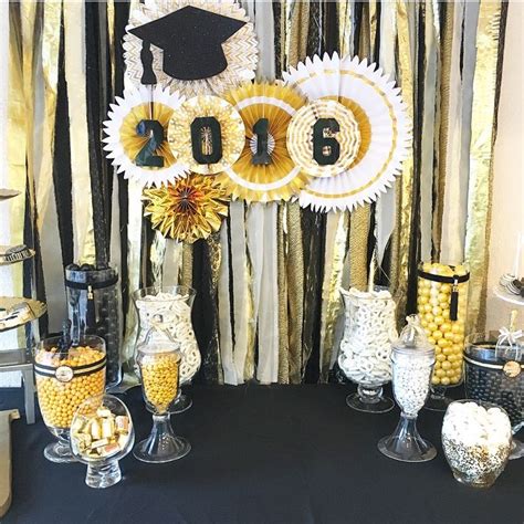 Blue christmas lights also make wonderful additions to add a. Graduation table backdrop using gold accent paper fans and ...