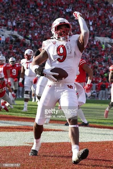 Tavion Thomas Of The Utah Utes Celebrates After Scoring A Rushing