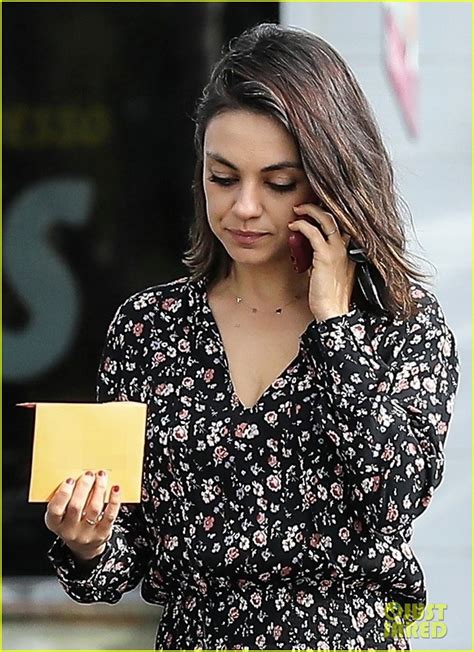 Mila Kunis Puts Her Legs On Display In Tiny Floral Print Romper Photo