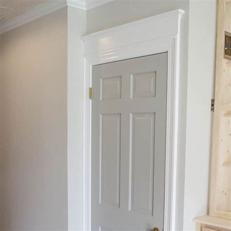 You used satin on the cabinets? Adding height to doors with additional trim on top. The ...