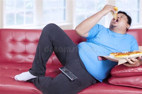 Overweight Man Sitting On The Couch Stock Photo Image Of Isolated