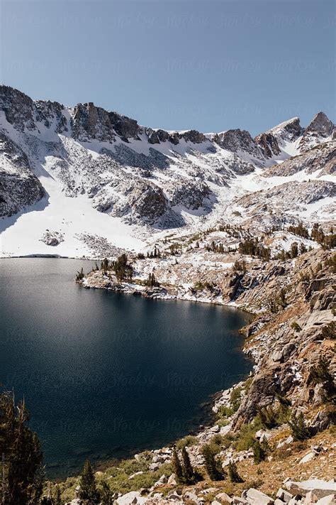 Alpine Lake In The Mountains Del Colaborador De Stocksy Simone Anne