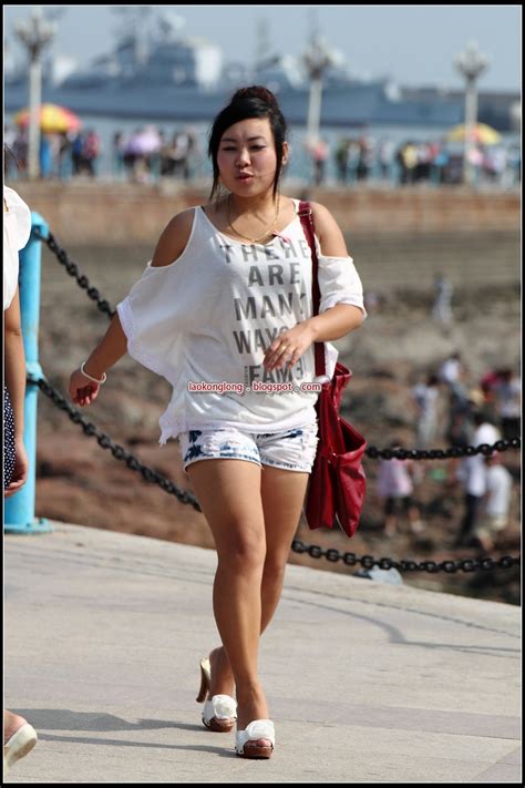 Asia Travel Photography From Chinese Shorts Girl Walking In The Street