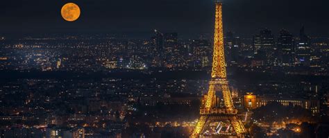 2560x1080 Resolution Eiffel Tower Cityscape In Moon Night 2560x1080