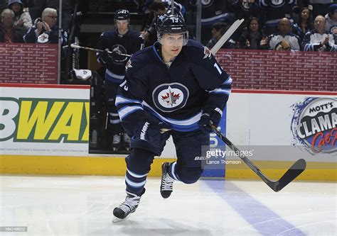 Kyle Wellwood Of The Winnipeg Jets Hits The Ice Prior To Puck Drop