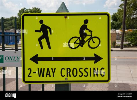 Sign Warning Of A Pedestrian And Bicycle Crossing Stock Photo Alamy