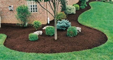 Since compost is made of organic materials, it enriches the soil as it decomposes. Mulch Bed Edging | Defined edges for your mulch bed ...