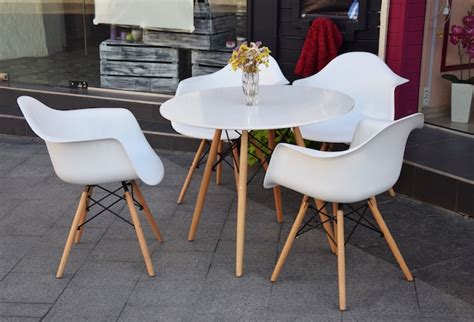 Premium Photo Outdoor Cafe With A Table And Chairs