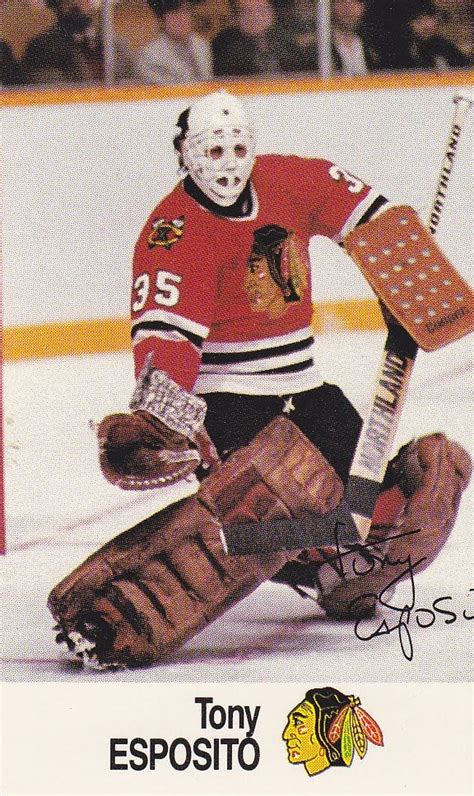 An Autographed Hockey Card With The Chicago Black Hawks Goalie In Red
