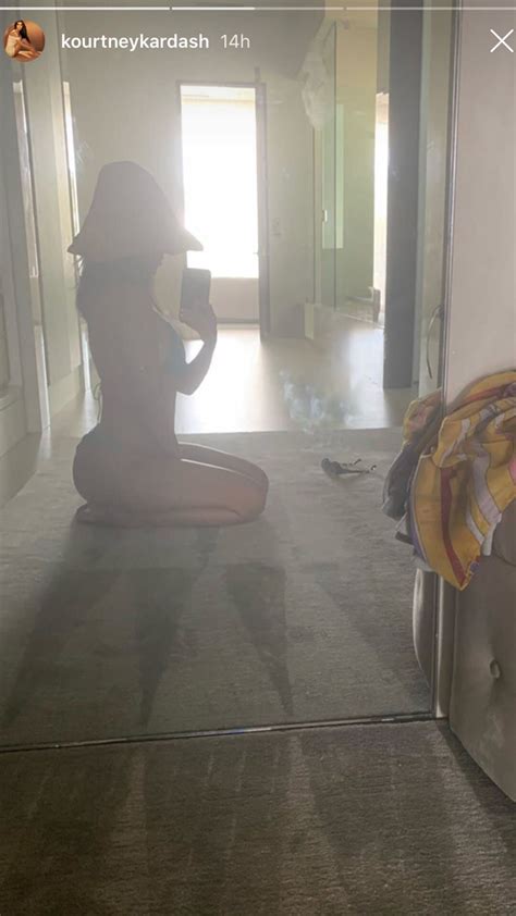 Kourtney Kardashian Snaps A Mirror Selfie While Wearing A Teal String Bikini
