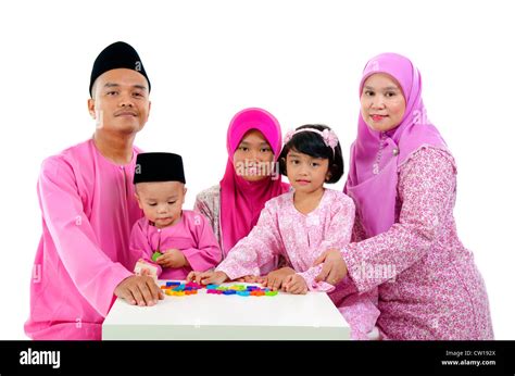 Malay Family During Hari Raya Aidilfitri Having Fun With Toys Stock Photo Alamy