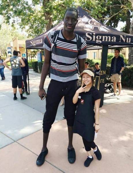 7 Foot 6 Inch Mamadou Ndiaye With One Of The Shortest Girls On Campus