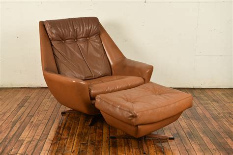 These two pieces are both supported by flared, solid wood legs for a retro pop. Danish Mid-Century Leather Lounge Chair and Ottoman - West ...