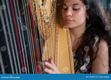 Detail Of A Woman Playing The Harp Stock Photo Image Of Heavenly