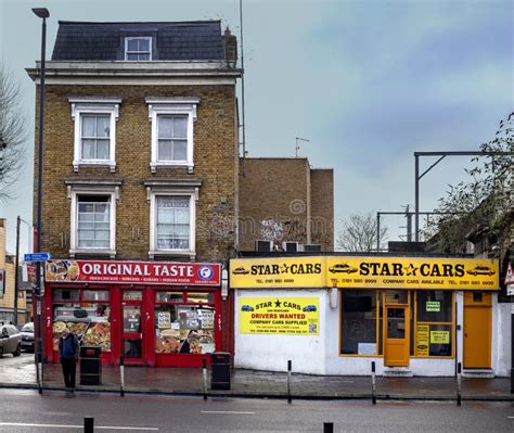 Shopfronts And Housing In Bow East London Editorial Stock Image