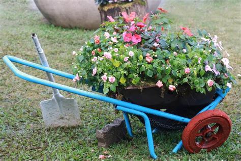 27 Wheelbarrow Flower Planter Ideas For Your Yard Large Flower Pots
