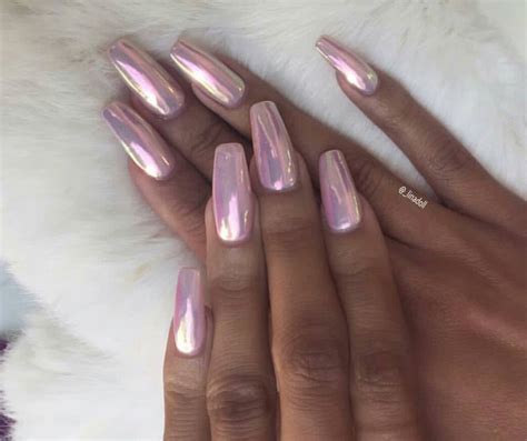Pale pink holographic chrome coffin nails | Pink chrome ... #inspiration #manicure #pink nails #moon nails #nude pink #pretty pink things #pretty pink #stellar #pantone pink #pale pink #pastel pink #rose quartz pink #millennial pink #pastel love #pastels #luxury #nails #crystals #pink nails #coffin nails #expensivetastexox #glam #girly #diamonds.