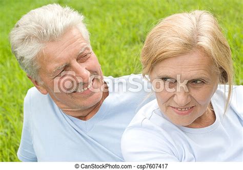 Old Couple Lying At Grass Portrait Of A Cute Old Couple At Grass Canstock