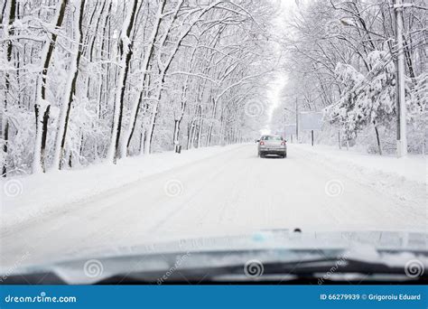 Hard Winter Traffic With Car On Snow Coverd Road Stock Image Image Of