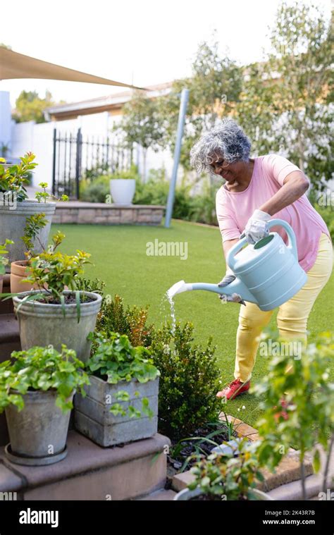 African Women Watering Plants Hi Res Stock Photography And Images Alamy