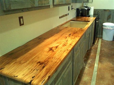 You have to consider how this will look from the side and how the added thickness ties into the cabinets. Solid Wood Counter top | Wood countertops, Countertops