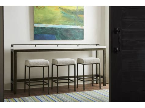 Spacious table top of this glass console table provides ample surface area for the display of plants, books or other decorative items. Curated Essence Console Table with Stools | Universal ...