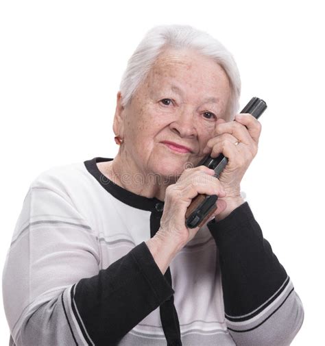 72,000+ vectors, stock photos & psd files. Old woman with pistol stock photo. Image of people, injury ...