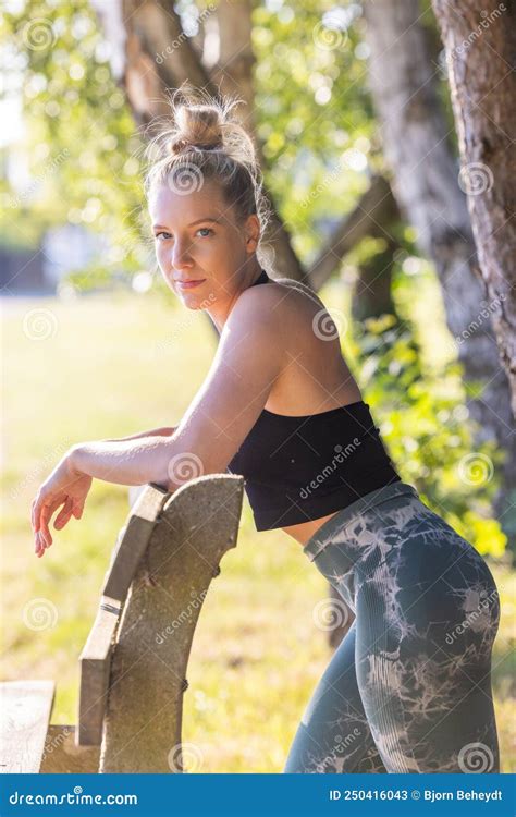 sweaty fitness girl taking breath on morning jogging female athlete runner resting workout