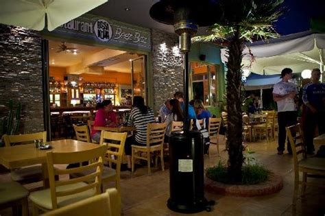 Votre cuisine c'est notre métier. Overview of the veranda and the bar. - Picture of Bossa Nova Restaurant and Beer Bar, Crete ...
