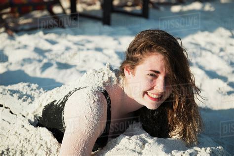 Girl Buried In The Sand Koh Samet Island Thailand Stock Photo
