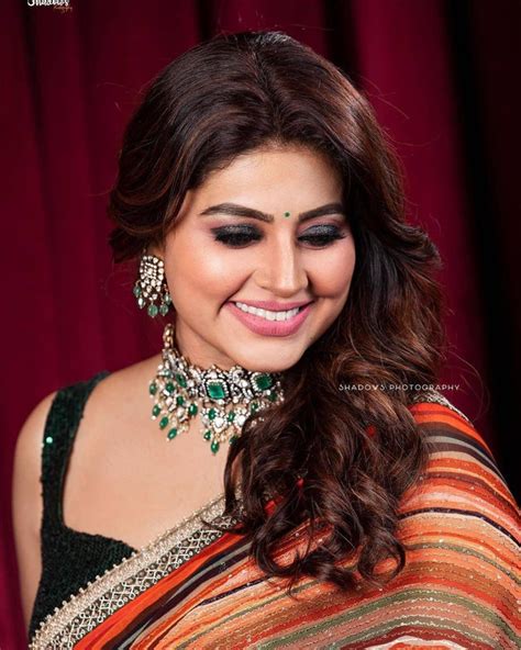South Indian Actress Sneha In Sleeveless Blouse Hot Photos Gallery