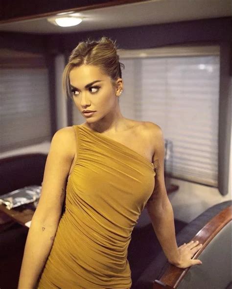 Rita Ora Pours Eye Popping Curves Into Nude Cocktail Dress For Sultry Exposé