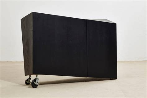 1980s Italian Black Wood Asymmetric Two-Door Cabinet Produced by Pallucco For Sale at 1stdibs