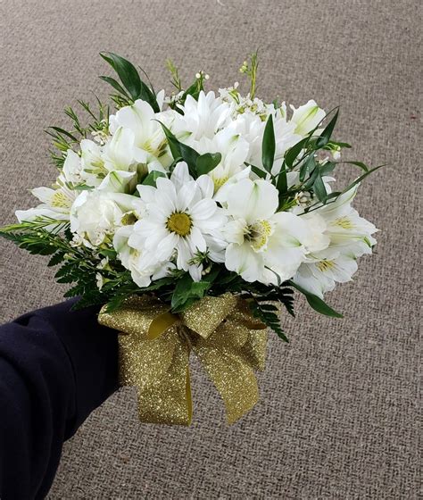 Assorted white flowers hand tied bouquet. | Hand tied bouquet, White flowers, Bouquet