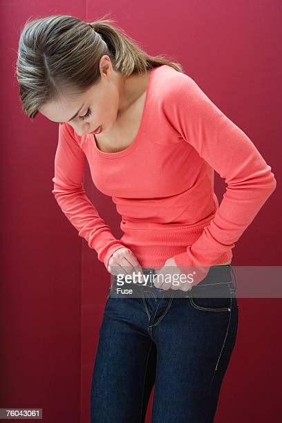 Woman Unbuttons Her Jeans Bildbanksfoton Och Bilder Getty Images