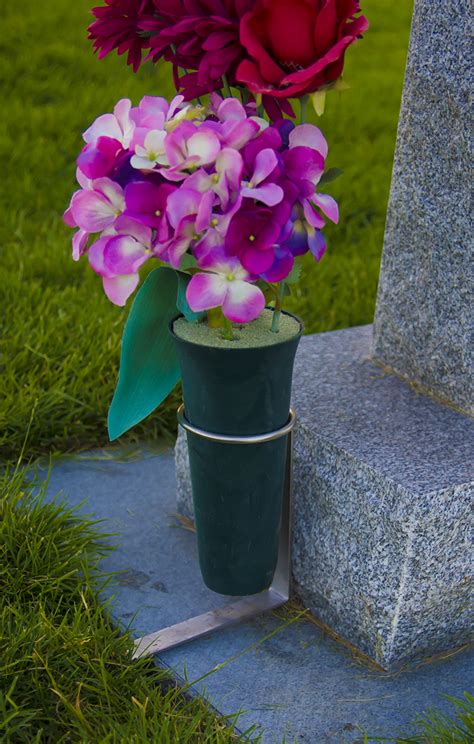 3" Flower Pot Holder for Cemeteries Metal plate at ground level stabilizes stand and eliminates lawn trimming.