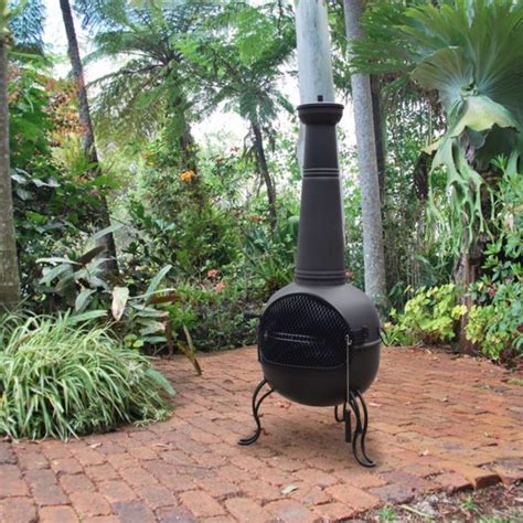 As much a decoration as a fire feature, chimeneas come in so many beautiful styles that you'll find it hard to pick your favorite! firehouse chimney #followitfindit | Outdoor, Fire pit landscaping, Outdoor fire pit